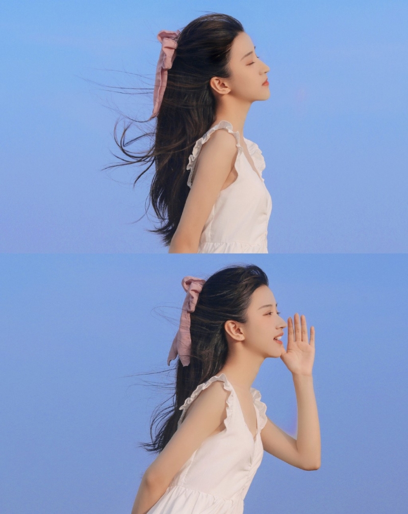 海边美女吊带白裙长发飘飘写真