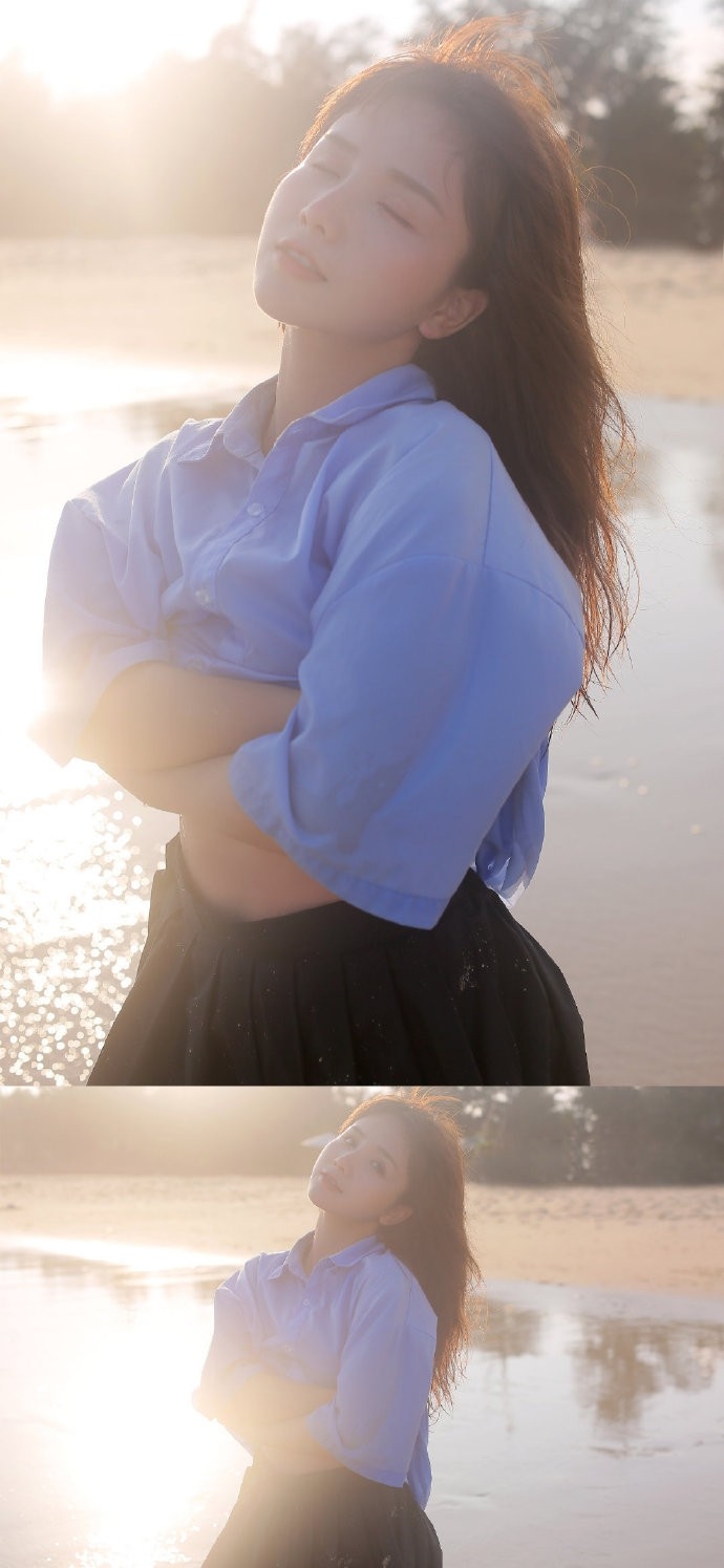 阳光下的清纯美女海边嬉戏美图