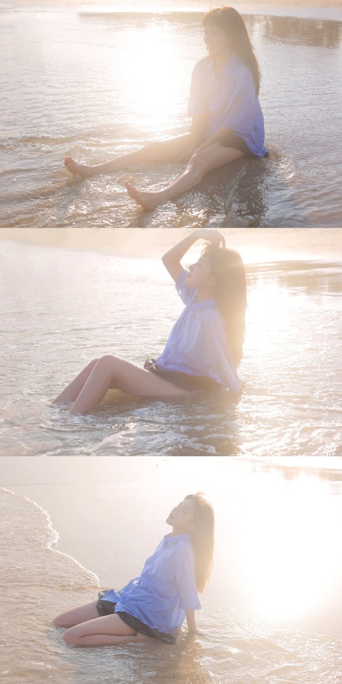 阳光下的清纯美女海边嬉戏美图